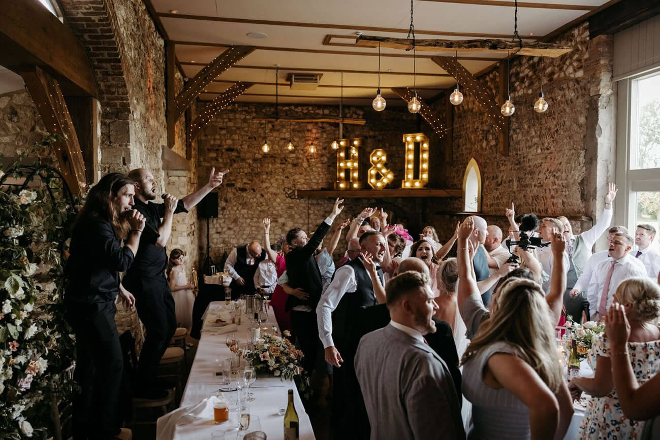 What do singing waiters sing?